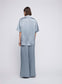 Satin Oversized Camper Collar Short Sleeve Shirt ‚Äö√Ñ√∂‚àö√ë‚àö‚àÇ‚Äö√†√∂‚àö√´‚Äö√†√∂¬¨¬Æ an relaxed oversized satin shirt, designed with a boxy shoulder, camper collar, breast pocket, and back yoke. Wear with the wide leg matching Mateo Pant. An elevated everyday look worn with sandals or go from day-to-night and pair with heels for a dinner matching set, dinner shirt, party set or event set.