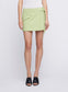 ANNA QUAN Pleat Wrap Mini Skirt. Designed for the fashion-forward, this skirt combines contemporary style with classic elegance. Embrace versatility with this wardrobe essential, perfect for both casual outings and dressed-up occasions. Mini-skirt, Micro mini-skirt, Work skirt, wool mini skirt, pleated short skirt, pleated mini skirt.